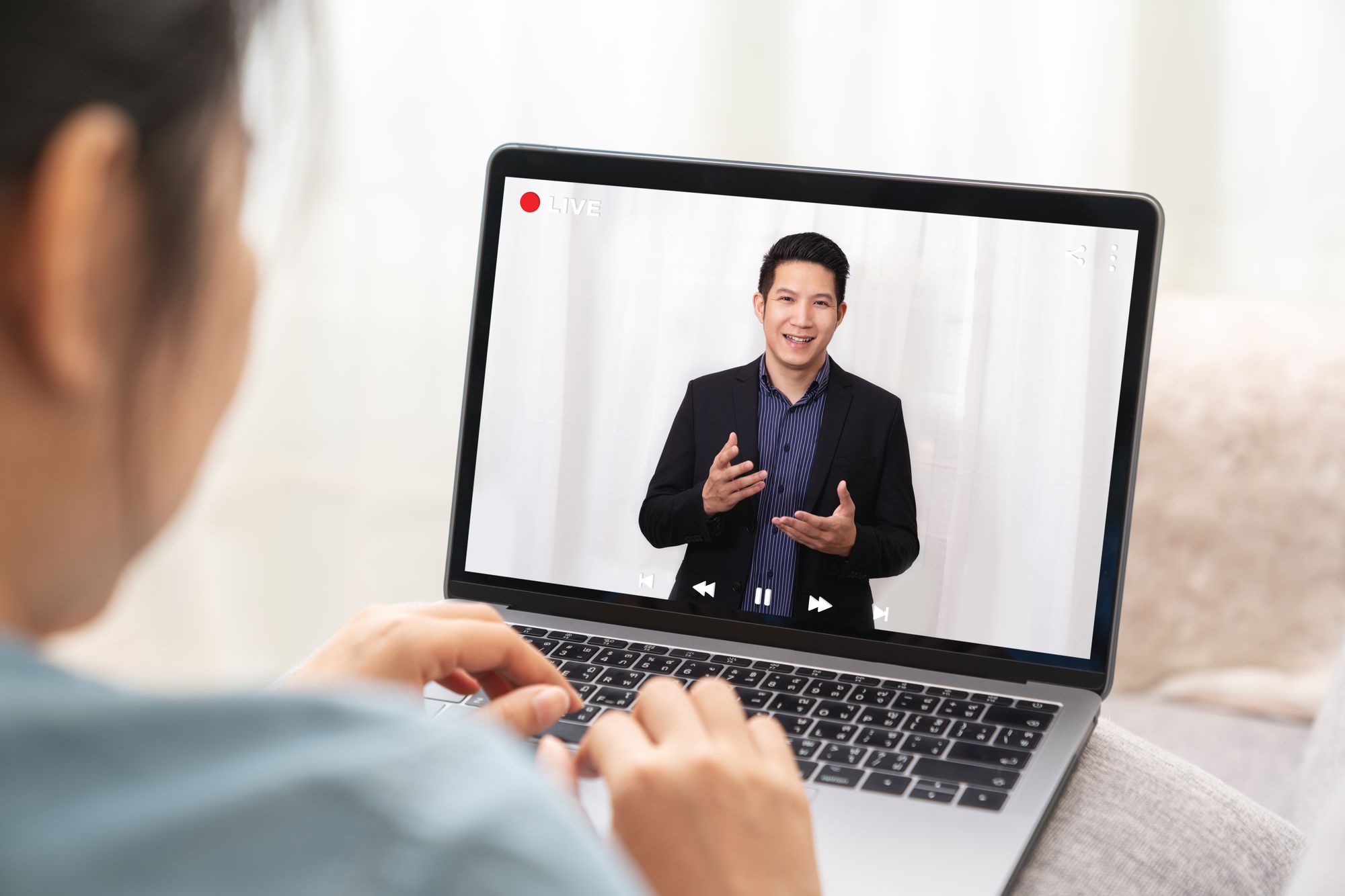 Virtual keynote speaker on a laptop